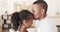 Love, forehead kiss and relax black couple dancing, bonding and enjoy marriage quality time together in living room