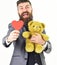 Love gifts concept Bearded man with happy face holds love gifts.