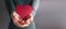 Love, Health Care, Donation and Charity Concept. Close up of Volunteer Holding a Red Heart