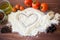 Love heart drawn in flour