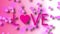 Love heart greeting on pink wallpaper background