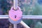 Love. A heart. The lock is tightly closed on the handrail as a sign of eternal love. Valentine\'s Day.