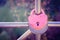 Love. A heart. The lock is tightly closed on the handrail as a sign of eternal love. Valentine\'s Day.