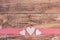 Love hearts decoration on wooden background