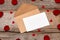 Love letter valentine rose and in envelope on wooden background