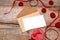 Love letter valentine rose and in envelope on wooden background