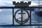 Love lock on fence with maritime anchor