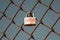 Love lock that reads `i love you` on the fences of the Golden Gate Bridge with a blue sky background, San Francisco, California, U