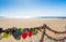 Love locks, beach and ocean in Puerto del Carmen boardwalk, Lanzarote