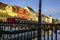 Love locks over tranquil Scandinavian Harbor with water reflections