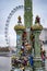 Love locks on Westminster Bridge on electric pole in london