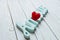 Love, love. red heart and the word amour on a white wooden background