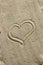 Love message on sand.