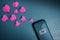 Love Message. Valentines Day Concept. Sending Heart Symbol to someone via Mobile Phone