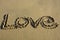 Love message written in sand