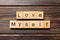 Love myself word written on wood block. Love myself text on wooden table for your desing, Top view concept