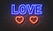 Love neon sign on brick wall background.