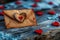 Love notes Valentine envelope placed on wooden hearts, rustic backdrop