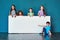 We love it And other kids will too. Studio portrait of a diverse group of kids standing behind a large blank banner