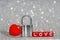 Love padlock with a red heart pendant