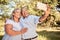 Love, phone and old couple taking a selfie in nature on a happy retirement holiday vacation in summer in Brazil. Smile