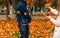 Love, relationship, family and people concept - close up of couple with maple leaf in autumn park.two people, a couple, a man and