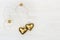 Love romance concept. Golden Hearts on natural wood surface. Valentines Day background