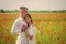 love and romance. romantic relationship. beautiful couple in love. man and woman in poppy flower field. summer vacation