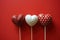 Love's Spectrum: A spectrum of heart-shaped items on sticks, symbolizing the wide range of emotions and expressions