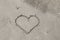 Love in the Sand: Hand-Drawn Heart and Sea Wave on the Beach