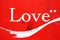 Love sign Valentine Day background word against a red wall