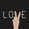 Love slogan t-shirt with hand. Word Love typography with fingers gesture. Fashion tee shirt design. Vector.