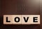 Love Spelled in Blocks on a Leather Holy Bible