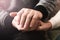 Love and support. Elderly people tenderly hold hands