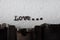 Love - text message on the typewriter close-up