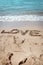 Love, text on sand at beach