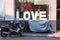 Love theme grange photo. Shop, cafe, cafeteria front view. Valentines day in grange style. Love concept in vintage style