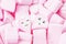 Love theme. Pink marshmallow hearts with funny face. Valentine`s day background