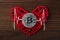 Love to bitcoins. Coin Bitcoin lies on a red heart