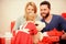 Love and trust in family. Bearded man and woman with little girl. Shopping online. father, mother and doughter child