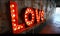 Love valentine's day message in illuminated vintage style broadway display lettering