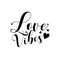 Love vibes -calligraphy phrase with hand drawn hearts.