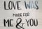 Love was made for me & you print on wood wall