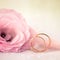 Love Wedding Background with Gold Rings and Beautiful Flower