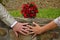 Love - wedding bouquet and hands