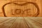 Love on wooden background