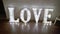 Love wooden sign decoration for wedding with light lamps