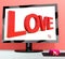 Love Word On Computer Screen Showing Online Dating