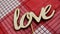 Love the word. Love the wooden letters on the red checkered napkin