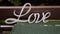 LOVE word on nature background.